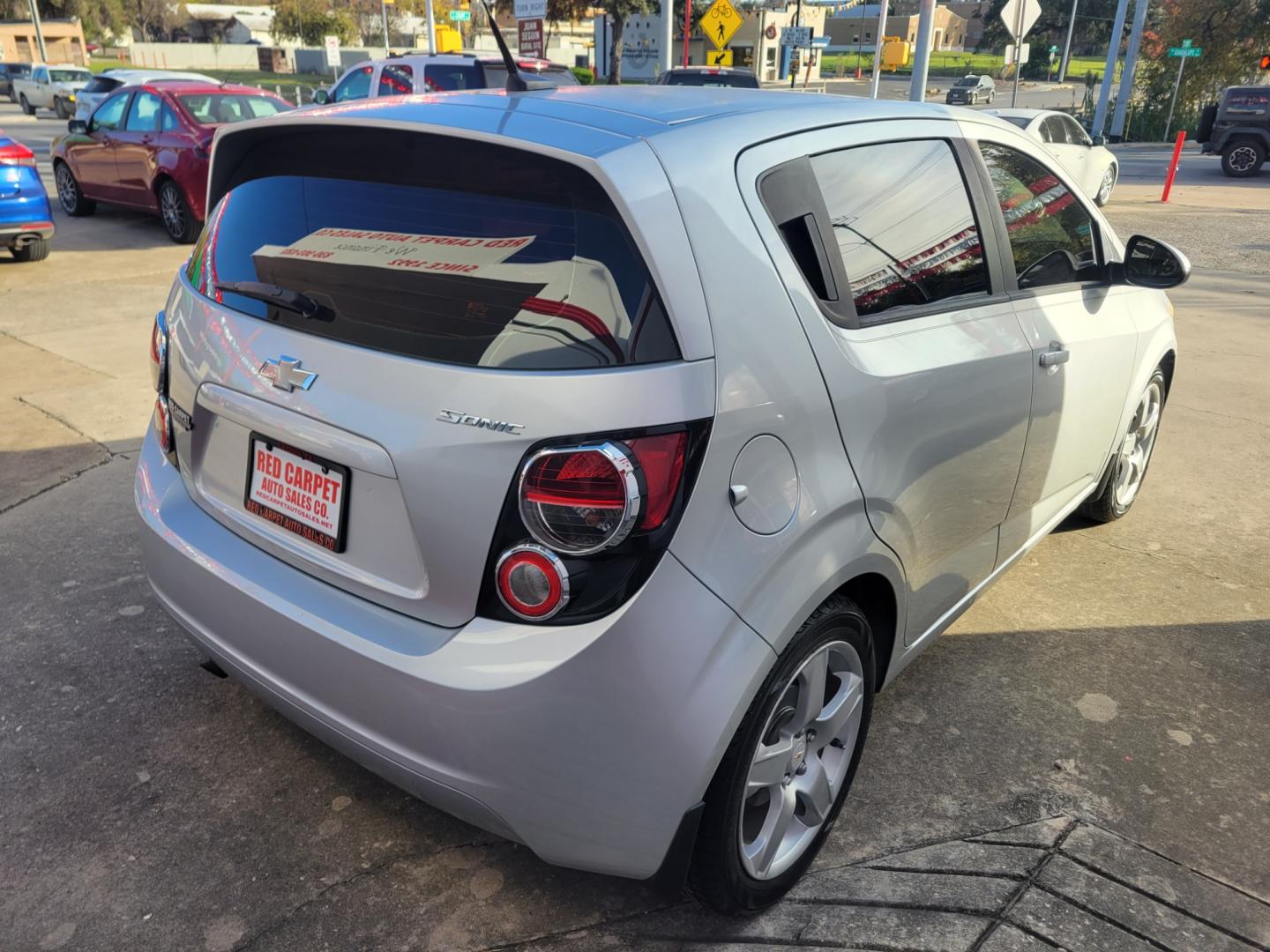 2014 SILVER Chevrolet Sonic (1G1JB6SH6E4) with an 1.8L I4 F DOHC 16V engine, Manual Transmission transmission, located at 503 West Court, Seguin, TX, 78155, (830) 379-3373, 29.568621, -97.969803 - Photo#2